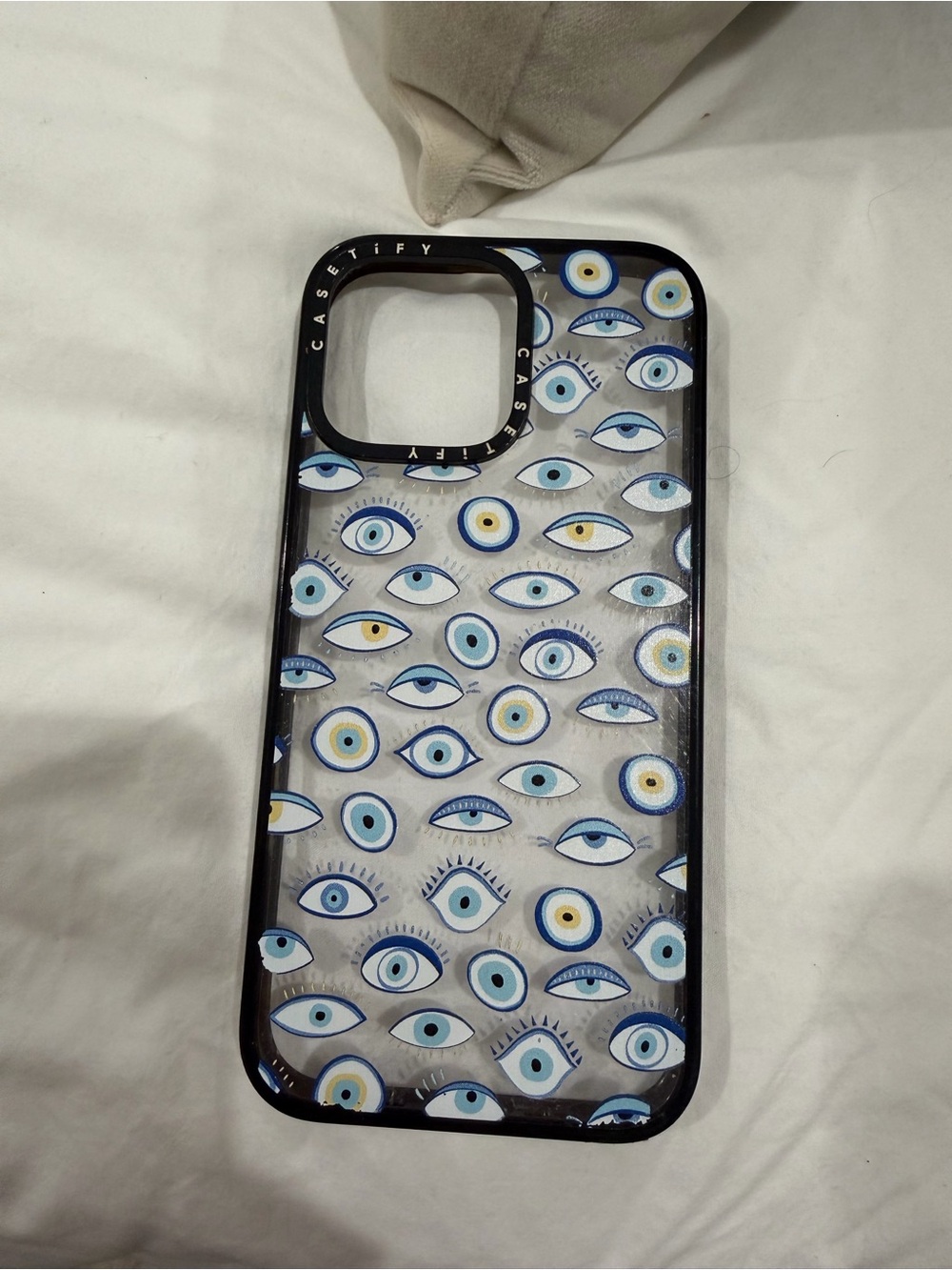 Casetify Clear Phone Case with Blue and Yellow Eye Motif